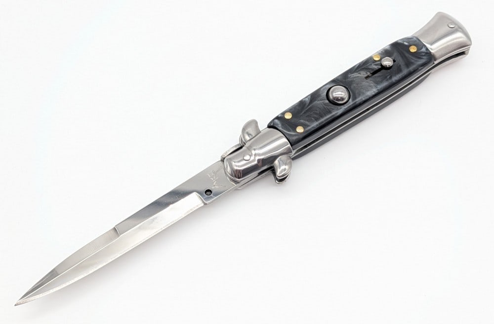 AKC 9in Marbled Black Synth Stiletto Switchblade Knife: Knife is in like new condition. Overall measures 5in when closed.