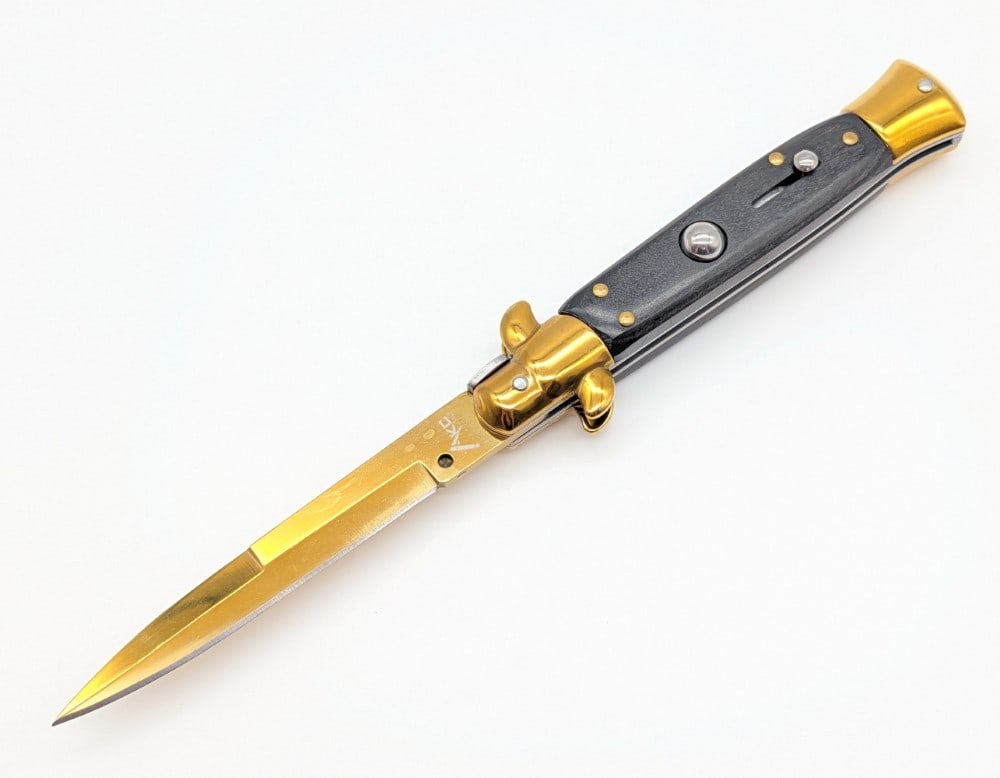 AKC 9in Gold Smooth Wood Stiletto Switchblade Knife: Knife is in like new condition. Overall measures 5in when closed.