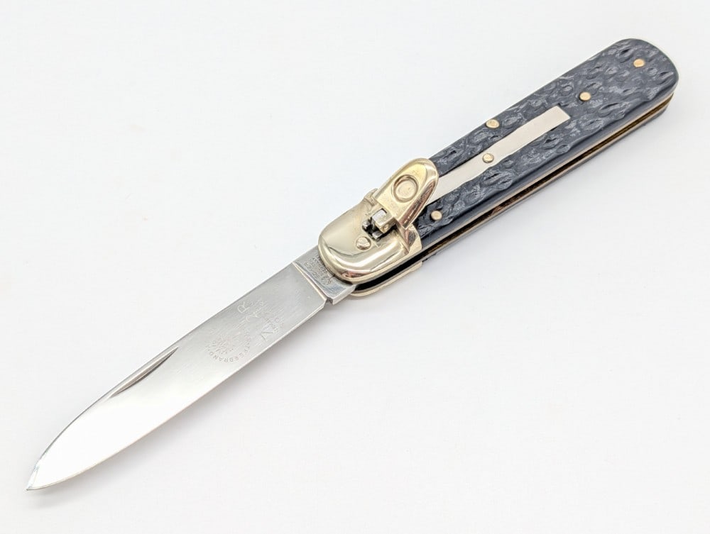 Boker Tree Brand Rough Black Leverlock Switchblade Knife 712R: Knife is in very nice condition with light scuffs from handling. Overall measures 4-1/2in when closed.