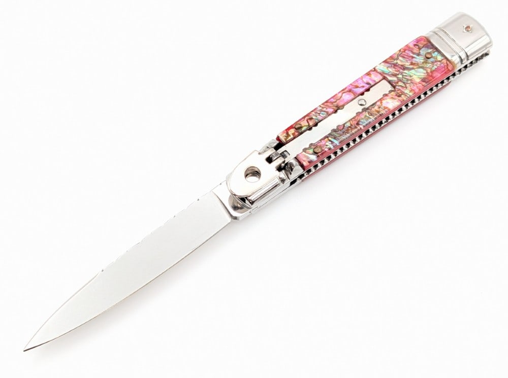Unmarked File Worked Faux Abalone Leverlock Switchblade: Features file work along the spine and spring and on the liners. Knife is in very nice condition with light scuffs from handling. Overall measures 4-1/2in when closed.