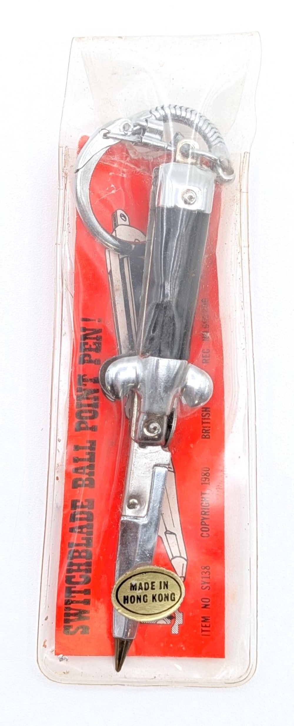 Novelty Stiletto Switchblade Ball Point Pen Key Chain: Pen is in very nice condition with light scuffs and tarnishing from handling. Overall measures 2in when closed.