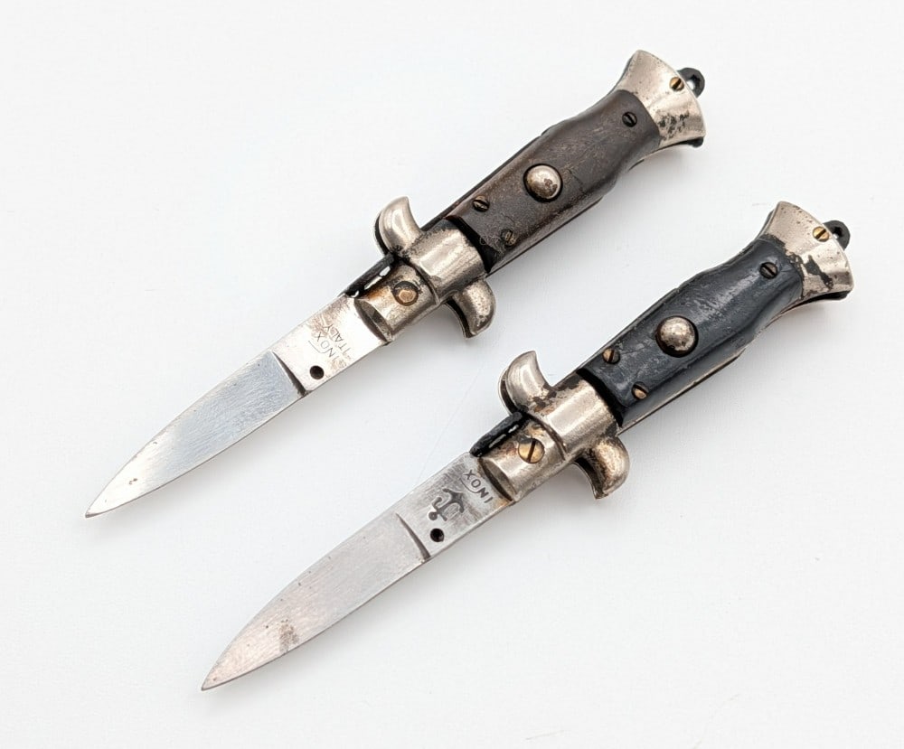 (2) Inox 4in Stiletto Switchblade Keychain Knives: Knives are in aged condition with rust and tarnishing.?