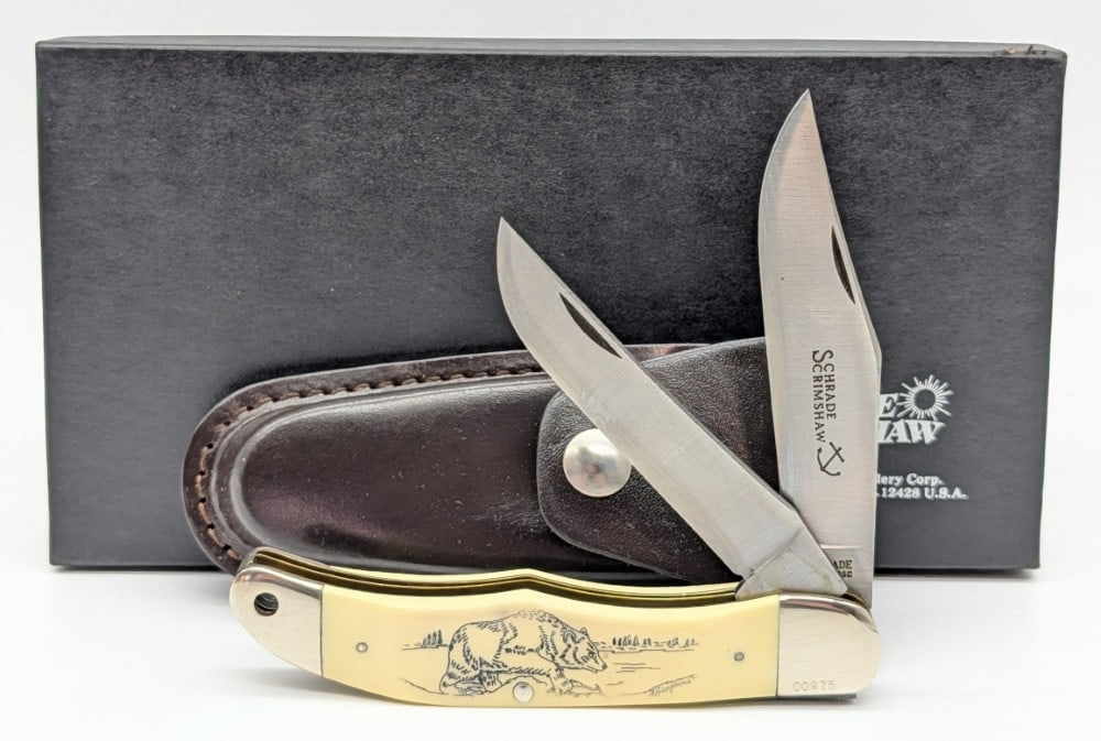 Ltd Schrade Cutlery Scrimshaw Bear Folding Hunter w/ Sheath & Box: Knife is numbered 00975, and is in like new condition. Overall measures 5-1/4in when closed.
