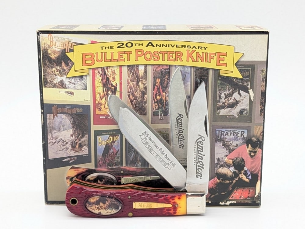 2002 Remington 20th Anni Bullet Poster Jigged Delrin Jumbo Trapper w/ Box: Knife is in very nice condition with tarnishing on the bolsters from age. Overall measures 4-1/2in when closed.
