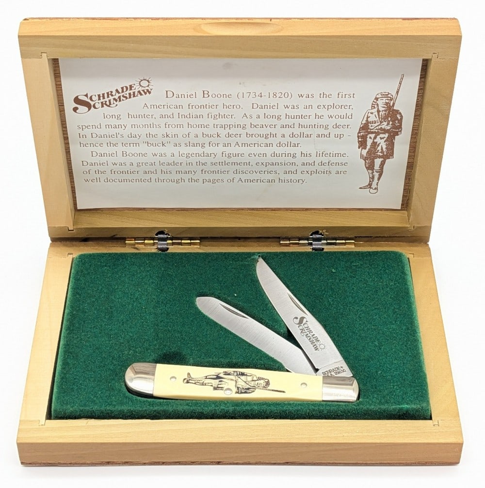 Schrade Cutlery Co. Scrimshaw Daniel Boone Trapper w/ Case: Knife is numbered 0785, and is in very nice condition with tarnishing on the bolsters from age. Overall measures 4-1/8in when closed.