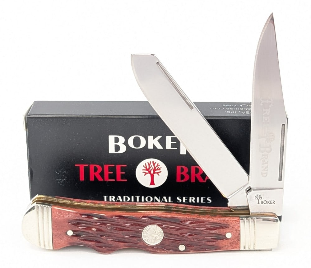 NIB Boker Tree Brand Red Bone Dual Lock Back Trapper: Knife is in new condition. Overall measures 4-1/8in when closed.