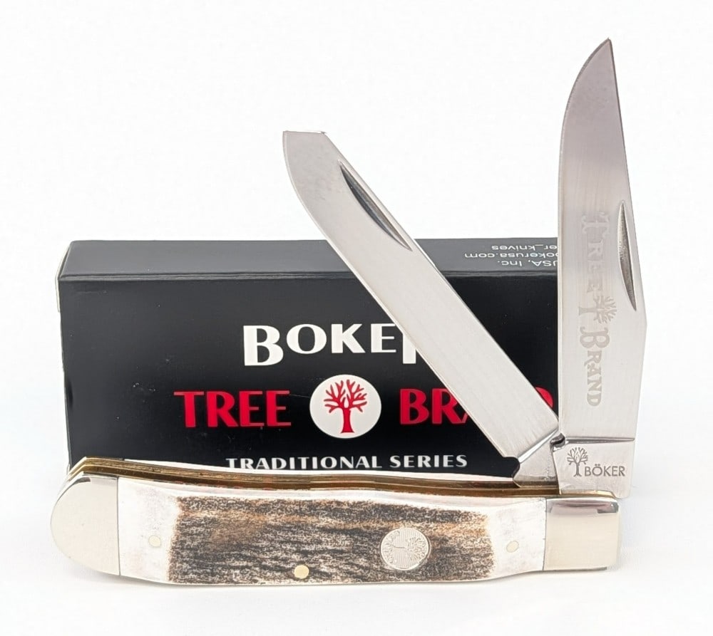NIB Boker Tree Brand Stag Trapper: Knife is in new condition. Overall measures 4-1/8in when closed.