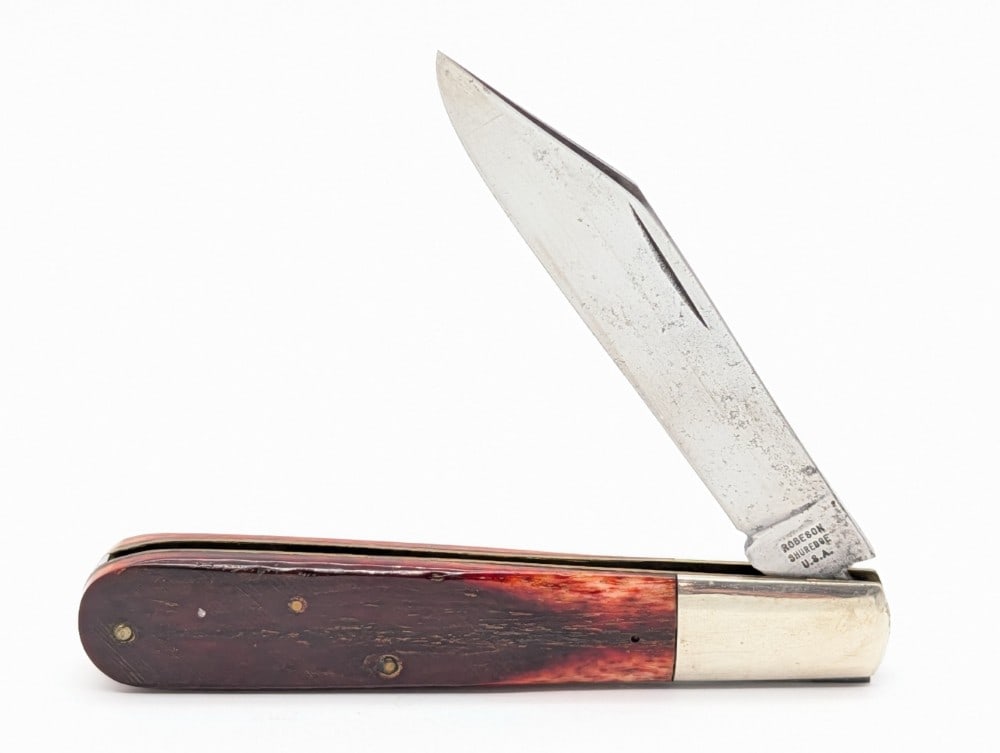 Robeson Shuredge Sawcut Pretty Bone Grand Daddy Barlow 512224: Knife is in good cleaned condition with scratches and carbon spots on the polished blade, and scuffs and dings on the bolsters. Overall measures 5in when closed.