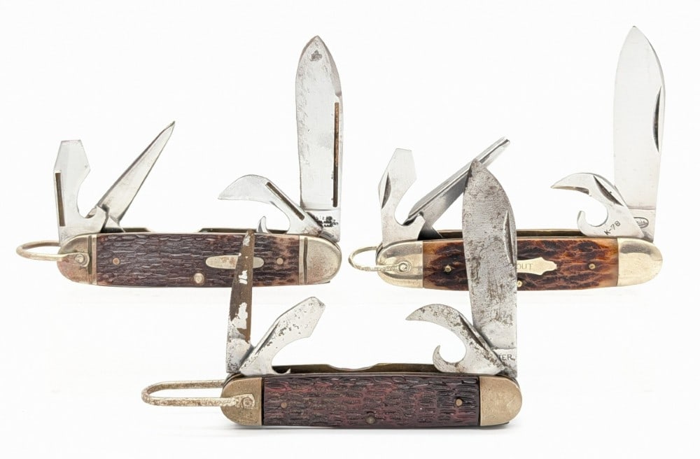 Premier, Western, & Ulster Scout Camp Knives: Knives are in various conditions with different amounts of scratches and tarnishing from use and age. Overall measures 3-3/4in when closed.
