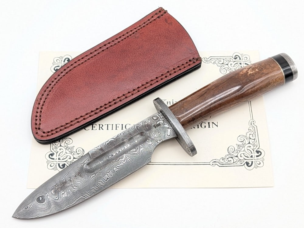 2001 Craig Steketee Stek Knives Damascus Spear Point Fighting Knife w/ Sheath & COA: Features a 360 layer basket weave damascus spear point blade with a fuller, a damascus oblong double guard, an Oosik handle with a buffalo horn spacer, and a damascus butt cap. Knife is in like new co