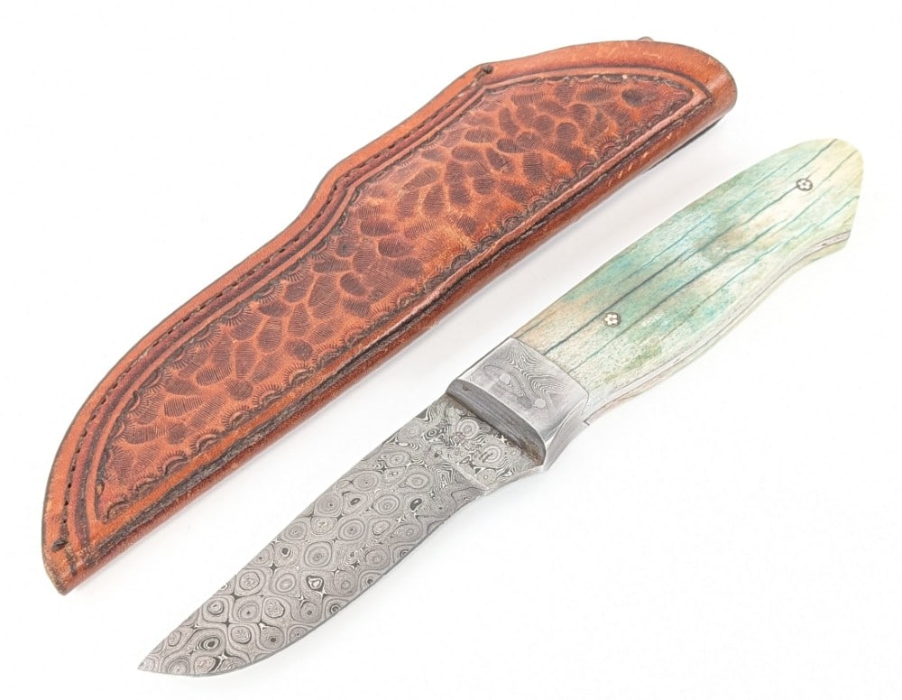 Ken McFall Raindrop Damascus Giraffe Bone Drop Point Hunter w/ Sheath: Features a gorgeous raindrop damascus blade, a damascus reduced guard, full tang handle construction, and green giraffe bone handle scales with mosaic pins. Knife is in like new condition. Blade lengt