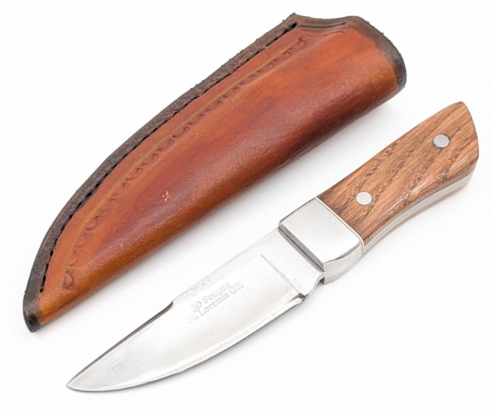 Custom JD Francis Straight Back Fixed Blade w/ Sheath: Features a straight backed blade with thumb notches, polished steel bolsters, full tang handle construction, and smooth wood handle scales. Knife is in good condition with some scratches and grind mar