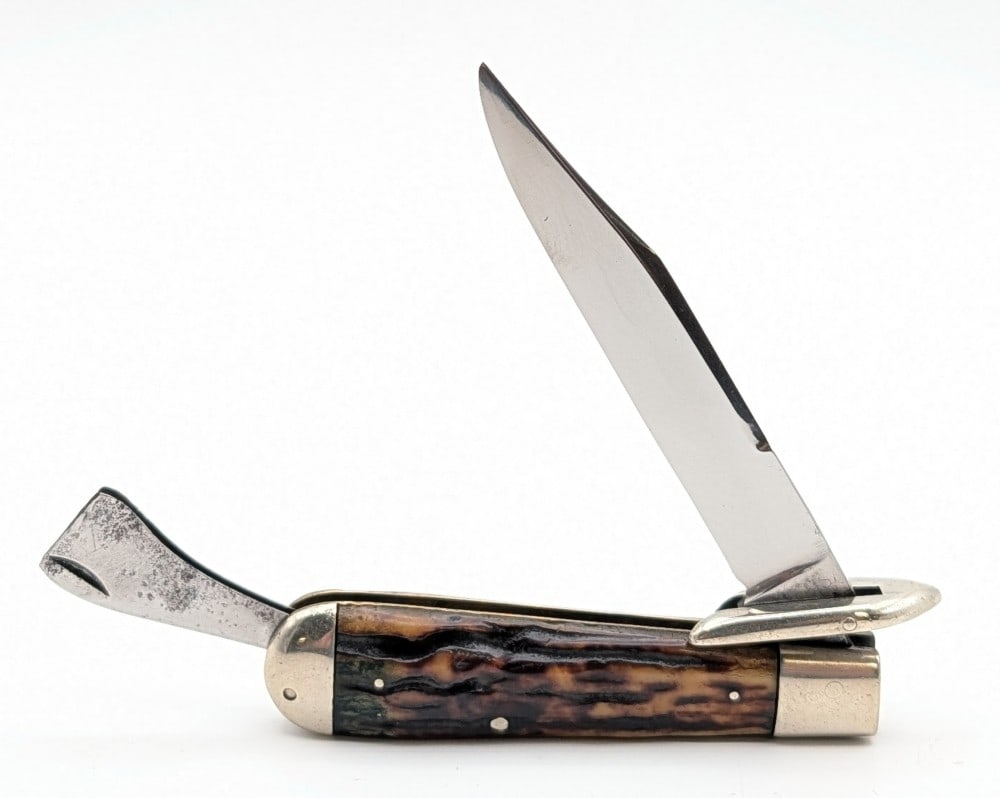 1914-35 Marble's Stag Safety Folding Knife: Knife is in fair cleaned condition with light scratches and some material loss on the polished blade, scuffs and dings on the polished guard and bolsters, the blade guard has been cut down. Blade leng