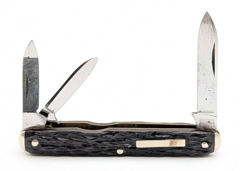 Robeson Shur-Edge Jigged Bone Pen Knife 632167: Knife is in nice condition with some scratches and tarnishing on the blades, and general scuffs and tarnishing on the bolsters. Overall measures 3-1/8in when closed.