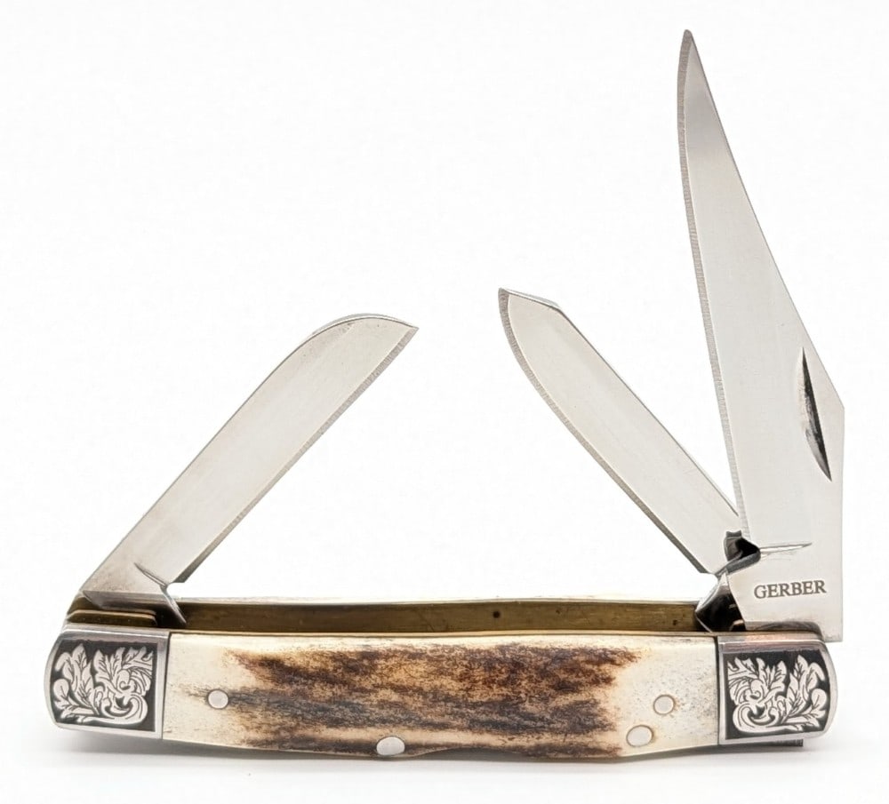 Gerber Scroll Bolster Stag Lockback Stockman: Knife is in very nice condition with minimal wear from handling. Overall measures 3-1/2in when closed.