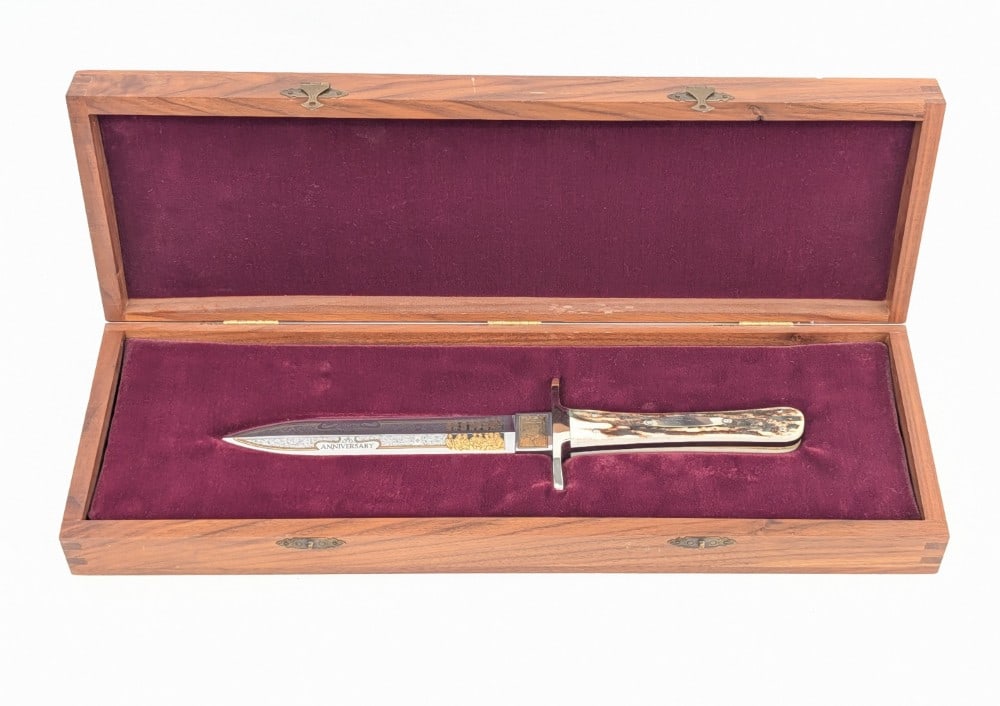 Buck Custom Geronimo 100th Anniversary Fixed Blade Knife w/ Case: Features etchings along the blade, a nickel silver double guard, full tang handle construction, and stag handle scales with a nickel silver shield. Knife is in like new condition. Blade length measure