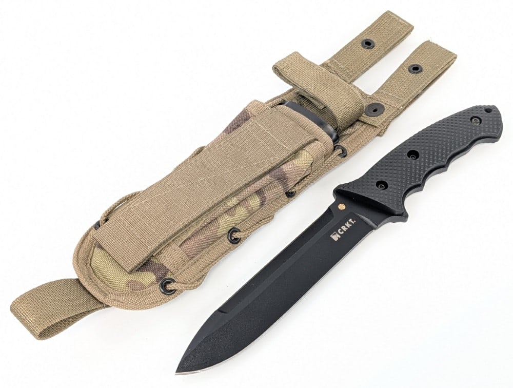 CRKT Elishewitz F.T.W.S. Fighting Knife w/ Sheath: Features a black finish drop point blade with a sharpened spine, integral guard, full tang handle, and checkered black G-10 handle scales. Knife is in like new condition. Blade length measures 6-1/4in