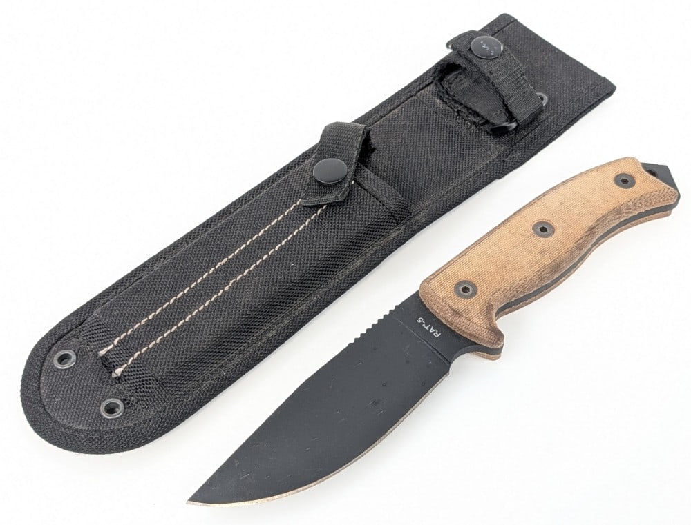 Ontario Knife Co. RAT 5 Canvas Micarta Hunting Knife w/ Sheath: Features a black finish drop point blade with thumb notches, a full tang handle, and canvas micarta handle scales. Knife is in very nice condition with minimal wear from handling. Blade length measure