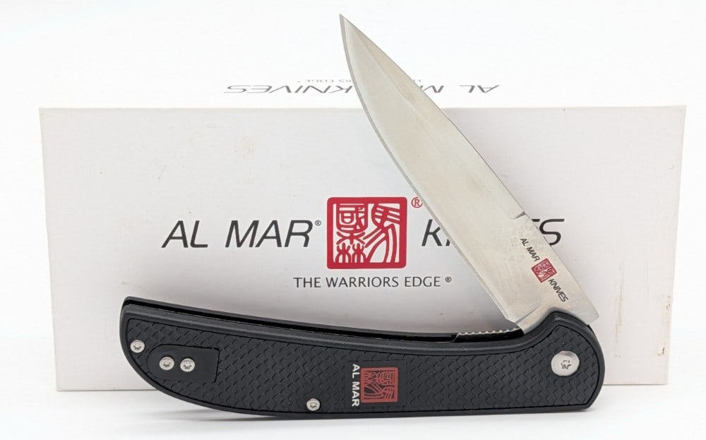 NIB Al Mar Talon Series Black Ultralight Flipper Folding Knife: Knife is in new condition. Overall measures 5in when closed.