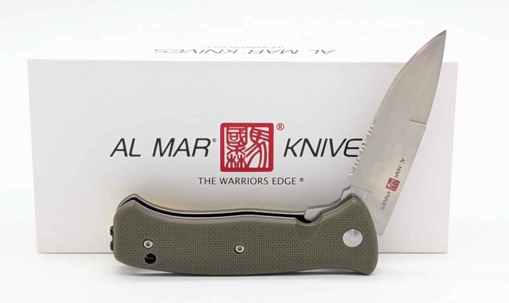 NIB Al Mar SERE 2020 OD Green Flipper Folding Knife: Knife is in new condition. Overall measures 4-7/8in when closed.