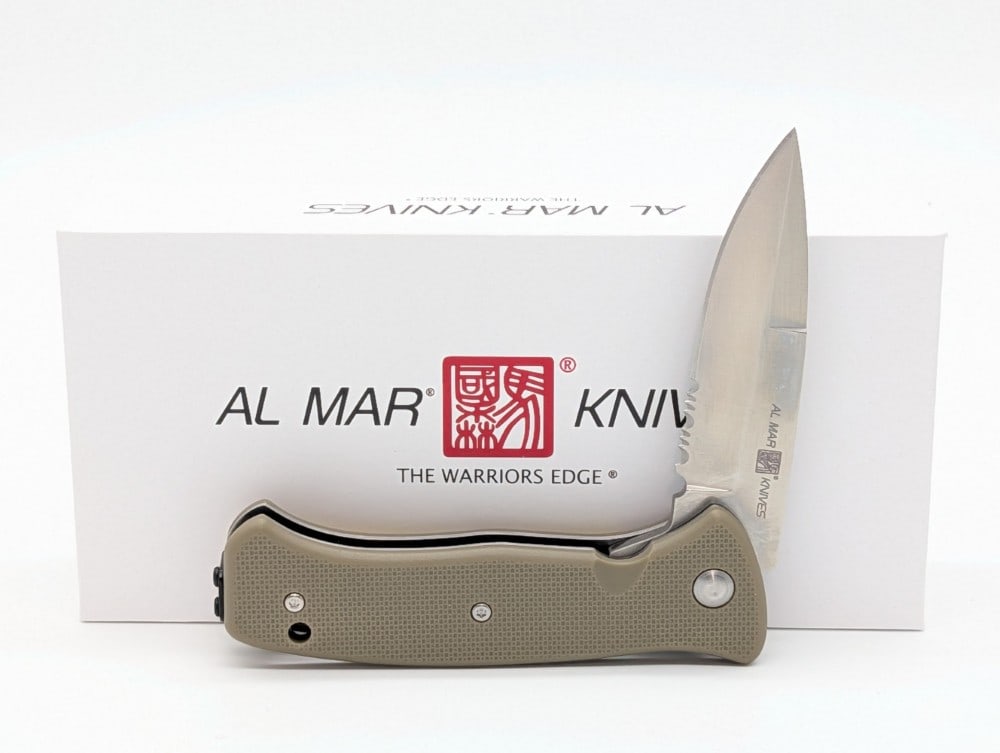 NIB Al Mar SERE 2020 Coyote Flipper Folding Knife: Knife is in new condition. Overall measures 4-7/8in when closed.