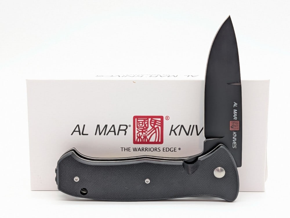 NIB Al Mar SERE 2020 Night G Series Flipper Folding Knife: Knife is in new condition. Overall measures 4-7/8in when closed.