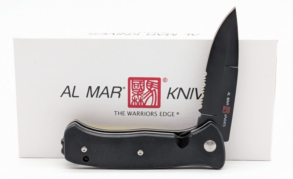 NIB Al Mar SERE 2020 Night G Series Flipper Folding Knife: Knife is in new condition. Overall measures 4-7/8in when closed.