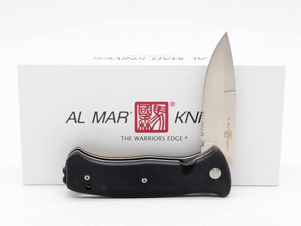 NIB Al Mar SERE 2020 G Series Black Flipper Folding Knife: Knife is in new condition. Overall measures 4-7/8in when closed.