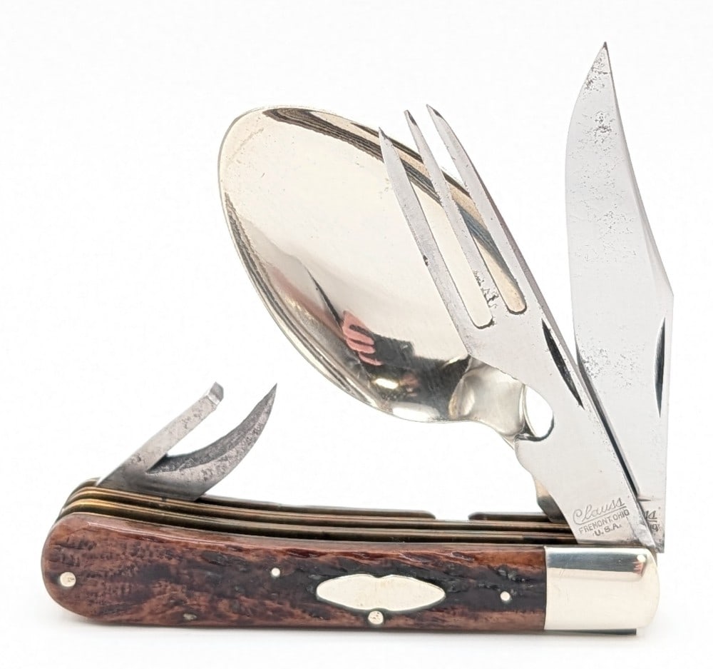 Antique Clauss Knives Jigged Bone Hobo Trapper: Knife is in very nice condition with some shallow pits and tarnishing on the blade, light scuffs on the polished bolsters, and very nice handle scales. Overall measures 3-7/8in when closed.