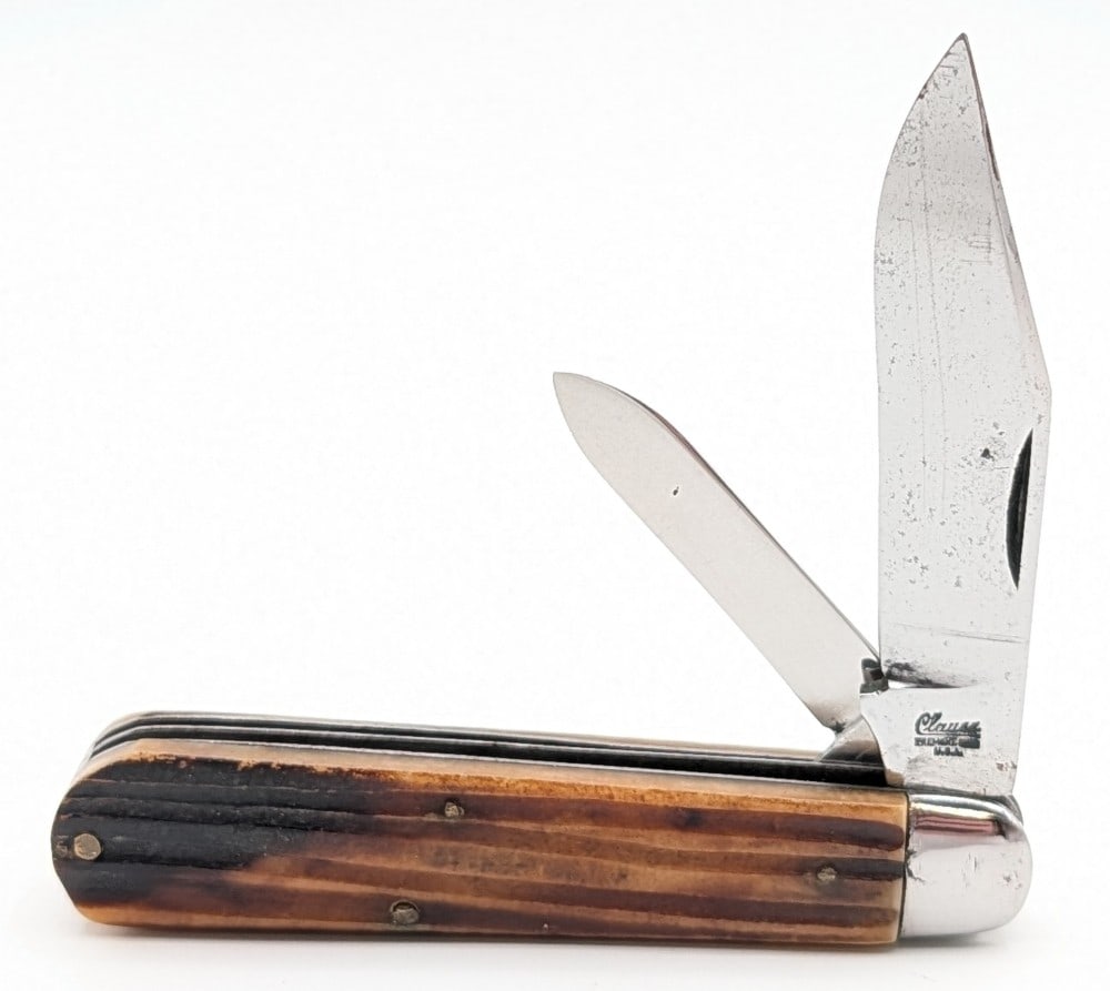 Antique Clauss Worm Groove Jigged Bone Jack Knife 36: Knife is in good cleaned condition with scratches and tarnishing on the blades, scuffs and some pits on the polished bolsters, and nice handle scales. Overall measures 3-3/4in when closed.