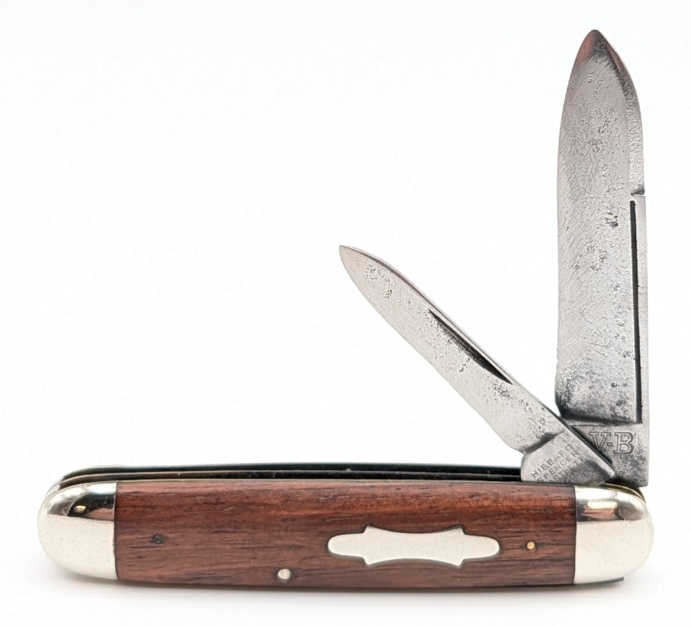 Hibbard Spencer & Bartlett OVB Smooth Wood Long Pull Jack Knife: Knife is in cleaned aged condition with heavy scratches and material loss on the blades, nice polished bolsters, and general scuffs on the handle scales. Overall measures 3-1/2in when closed.
