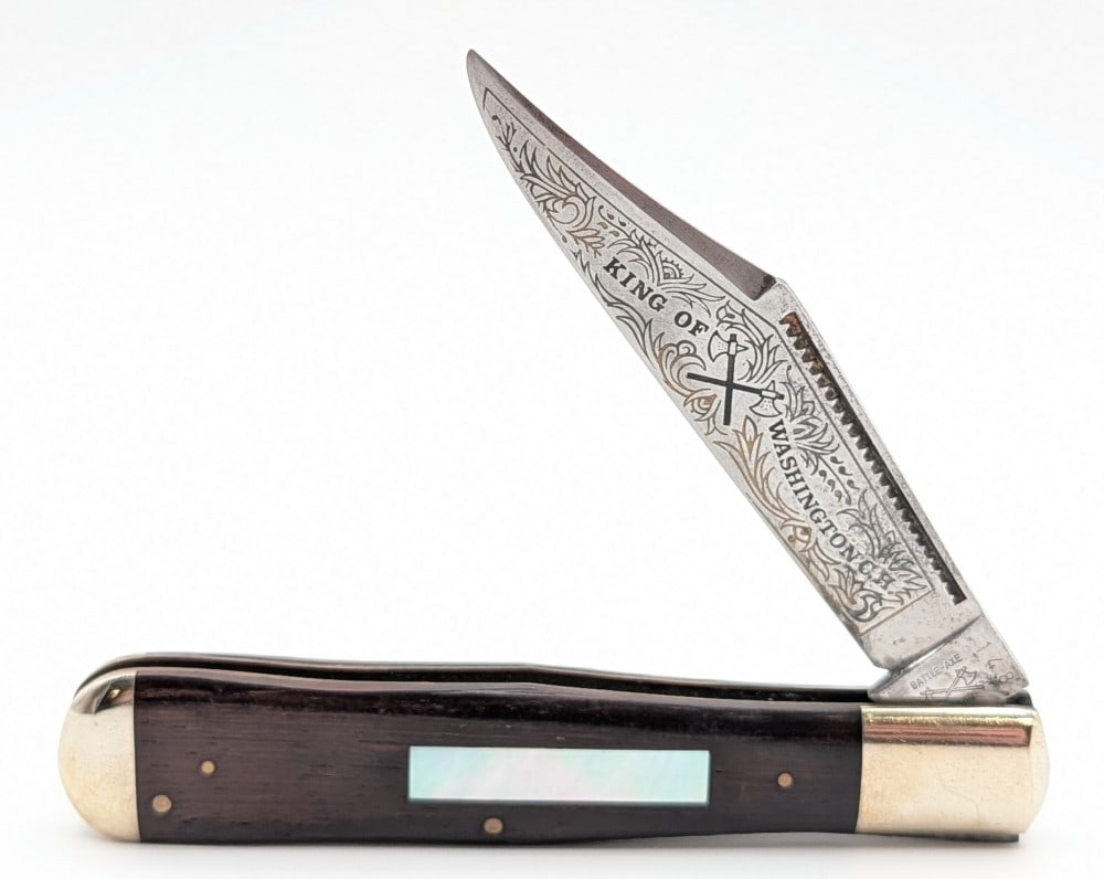 Ltd Battle Axe Brand King of Washington Pearl Shield Smooth Wood Coke Bottle: Knife is numbered 148 and is in aged condition with heavy scratches and tarnishing on the blade, scratches and dings on the bolsters, and scuffs on the handle scales. Overall measures 5-1/4in when clo