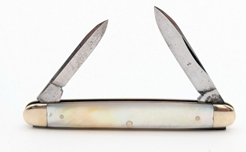 Western State Mother of Pearl Pen Knife: Knife is in nice condition with some scratches on the blade, and light scuffs and tarnishing on the bolsters. Overall measures 2-3/4in when closed.