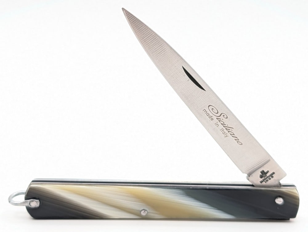 M. Fraraccio Inox Horn Handle Siciliano Folding Knife: Knife is in very nice condition with minimal wear from handling. Overall measures 4-5/8in when closed.
