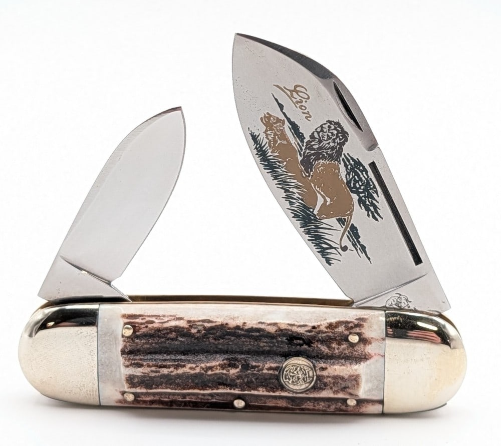 Ltd 1995 Bull Dog Brand The Lion Stag Elephants Toe: Knife is numbered 014, and is in very nice condition with light tarnishing on the bolsters from handling. Overall measures 4-1/4in when closed.