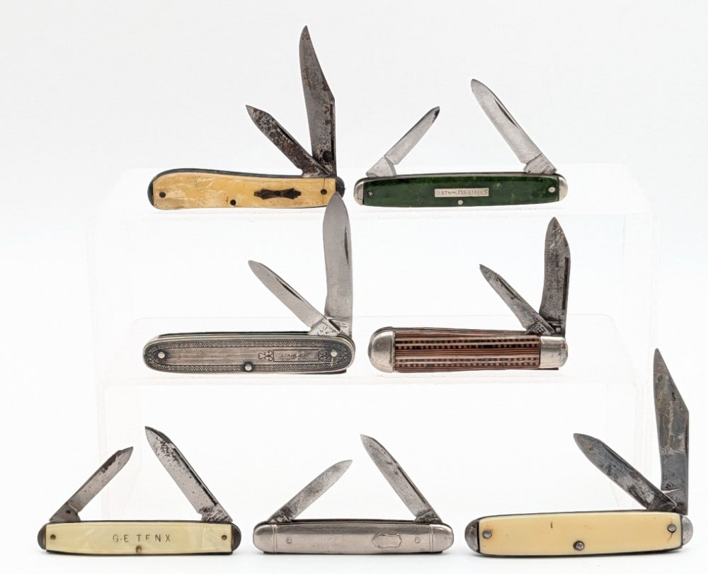 (7) Various Brand Vintage Folding Knives: Brands include L.F.&C., Imperial, Kutmaster, Stainless, and other brands. Knives are in worn aged condition with heavy scratches and rust from use and age. Largest overall measures 3-1/2in when closed