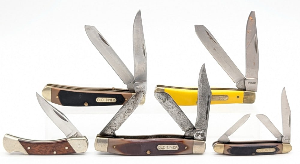 Various Model Schrade Folding Knives: Knives are in various condition with different amounts of scuffs and wear from use and handling. Largest overall measures 3-7/8in when closed.