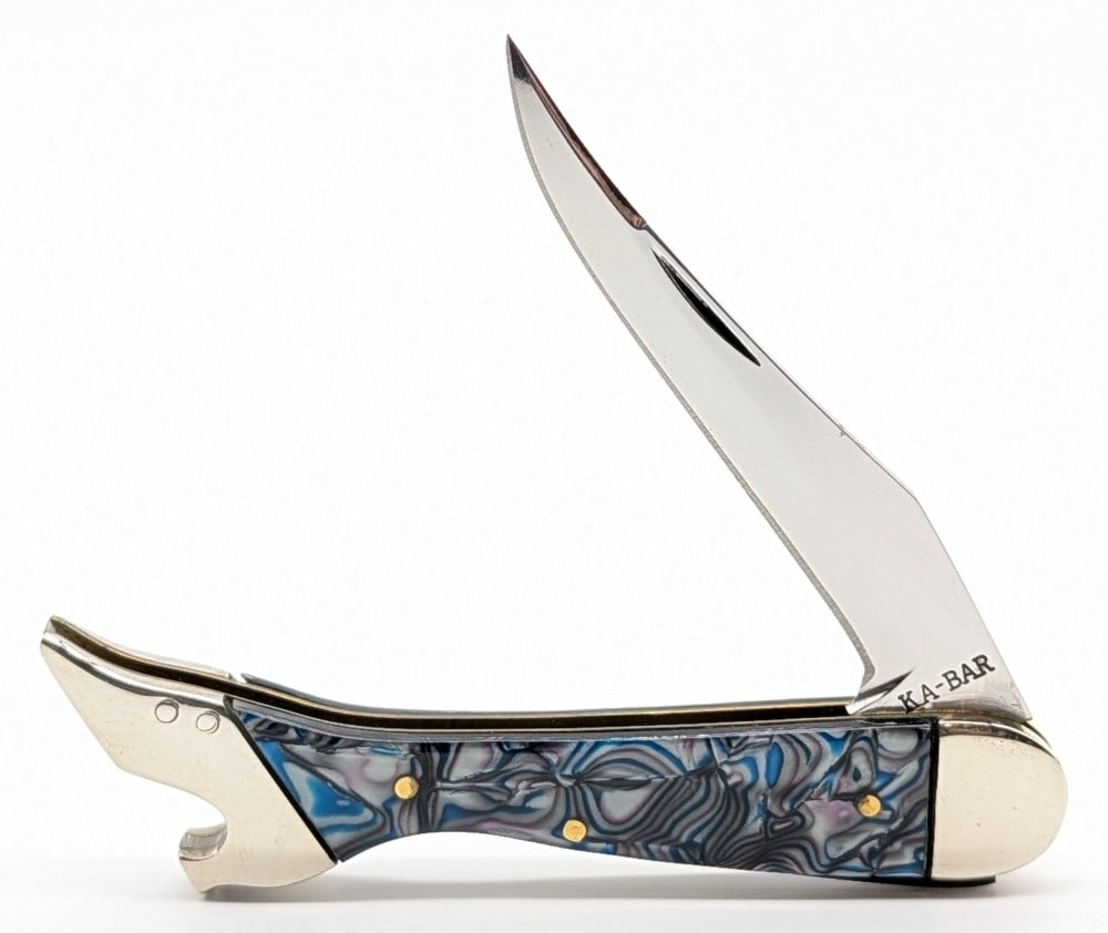 Ka-Bar Abalone Pattern Ladies Leg Knife LL-86: Knife is in very nice condition with light tarnishing from handling. Overall measures 4-5/8in when closed.