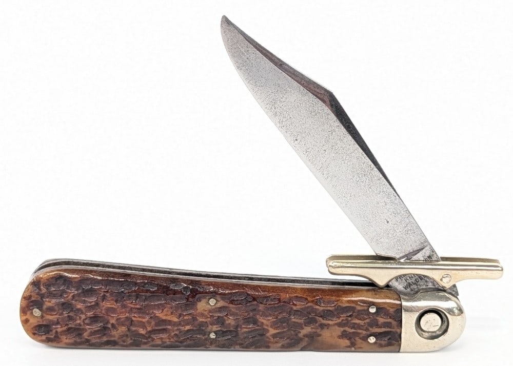 Press Button Knife Co. Jigged Bone Swing Guard Switchblade Knife (1 of 4)