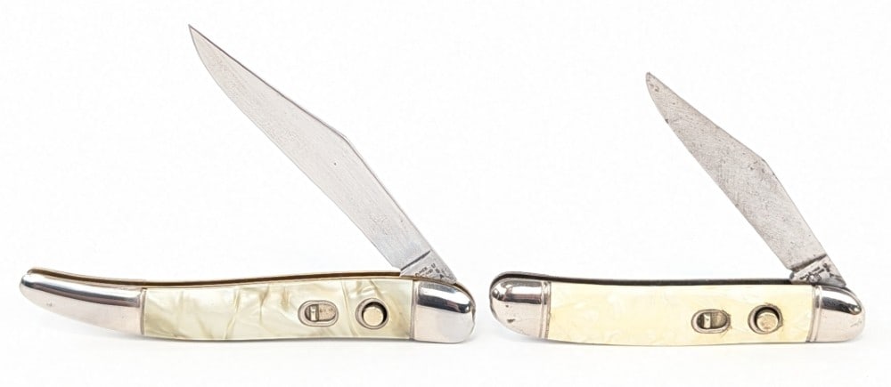 Hammer Brand Faux Pearl Switchblade Knives: Knives are in both nice and used conditions with the smaller knife having much heavier scratches and tarnishing from use and age. Largest overall measures 4-1/4in when closed.