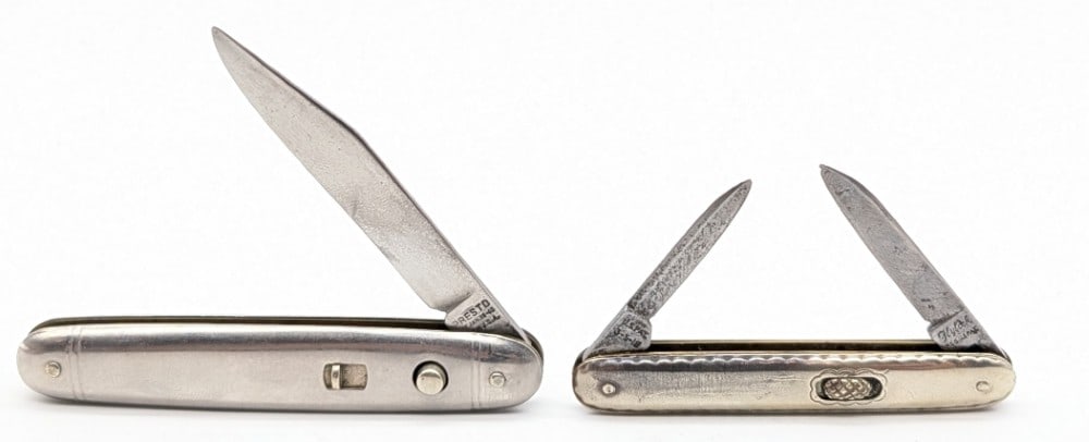 Presto & Flylock Metal Switchblade Knives: Knives are in fair condition with scratches and pits on the blades, and general scratches and wear on the handles. Blade springs work and lock open. Overall measures 3-3/8in when closed.