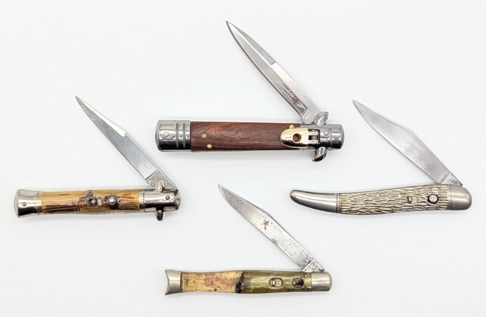 (4) Various Switchblade Knives: Includes Inox, AKC, Schrade, & Imperial. Knives are in different conditions with the Schrade knife being only for parts. Largest overall measures 4-1/2in when closed.