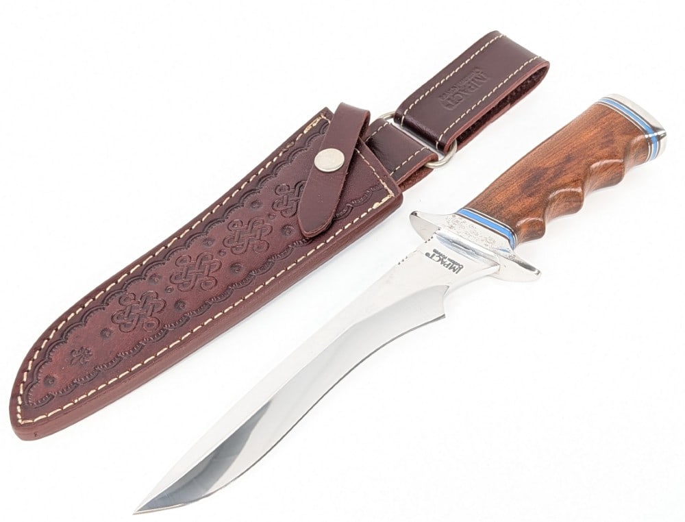Impact Custom Knives Smooth Wood Bolo Blade Knife w/ Sheath: Features a mirror polished bolo blade with some file work, a polished steel double guard, finger groove smooth wood handle with blue spacers, and a polished steel butt cap. Knife is in nice condition 