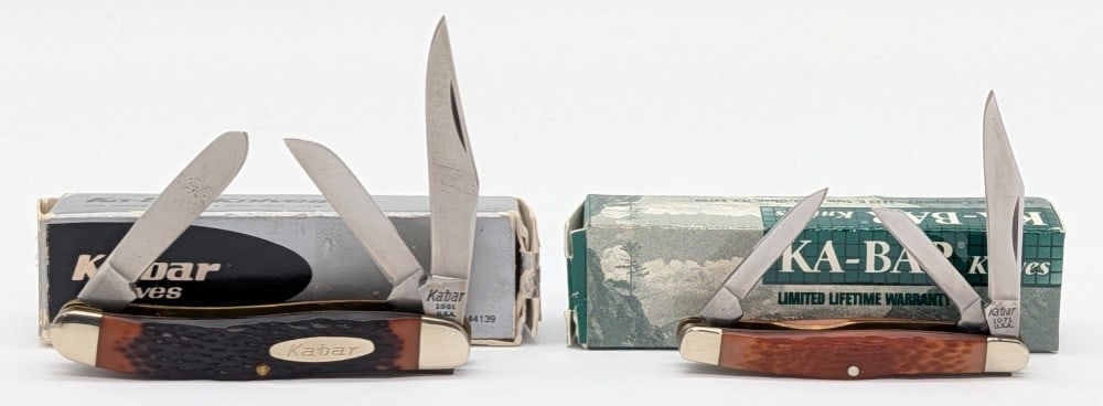 Ka-Bar Jigged Delrin Medium & Small Stockmans w/ Boxes: Knives are in new condition. Largest overall measures 3-1/4in when closed.