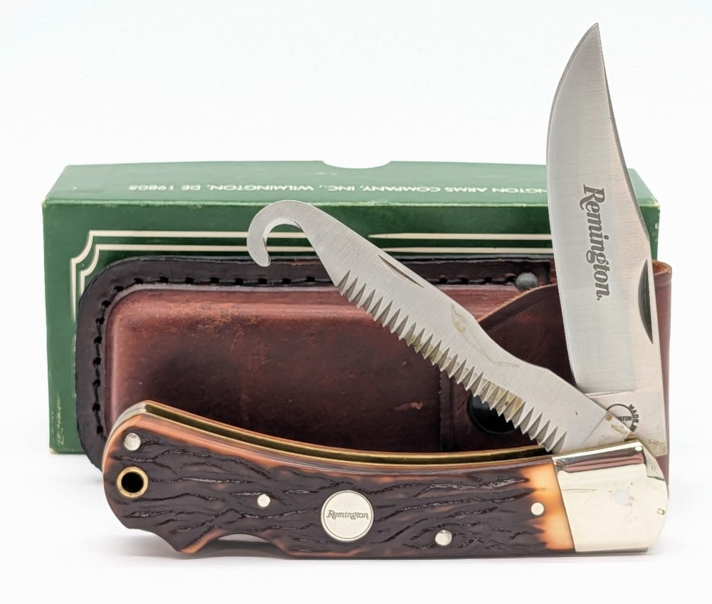 Remington Jigged Delrin Big Game R3-D w/ Sheath & Box: Knife is in like new condition. Overall measures 4-3/4in when closed