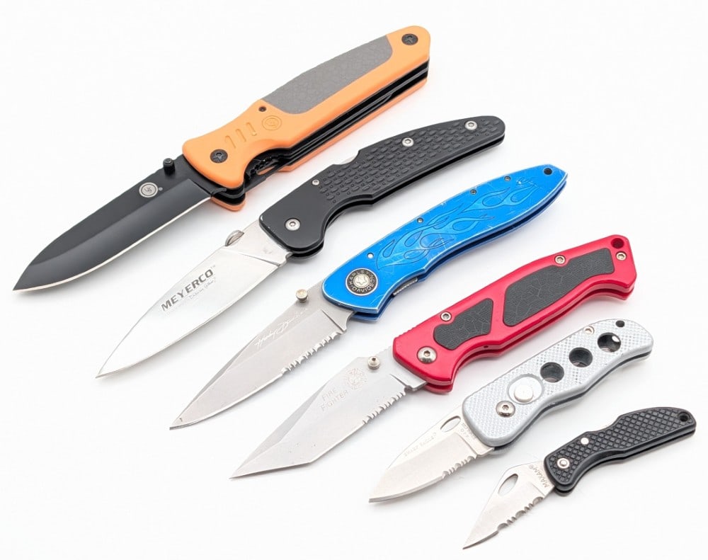 Schrade & (2) Unmarked OTF Switchblade Knives: Knives are in nice condition with light scuffs from handling. Largest overall measures 5-1/4in when closed.