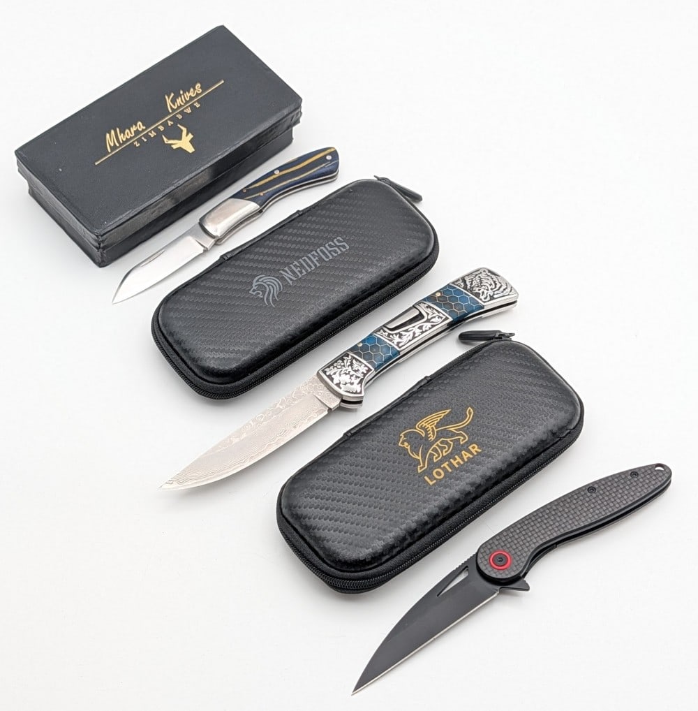 Mhara Knives, Nedfoss, & Lothar Folding Knives w/ Cases & Box: Knives are in new condition.
