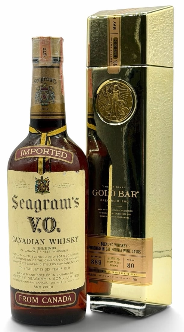 (2) 1970 Seagram's V.O. Canadian Whisky 86.8 Proof 750ml & Gold Bar Blended Whiskey Finished In CA: (2) 1970 Seagram's V.O. Canadian Whisky 86.8 Proof 750ml & Gold Bar Blended Whiskey Finished In CA Casks 80 Proof 750ml. Both of these very nice bottles of whiskey are still factory sealed and are in 
