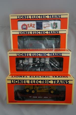 Lot of 4 Lionel Cars: #17219 Taz 40th Birthday Box Car,: Lot of 4 Lionel Cars: #17219 Taz 40th Birthday Box Car, #16710 Operating Missile Car, #17515 Norfolk Southern Flat Car w/ Tractors, & #16934 Penn Flat Car w/ Etrl Road Grader. All MIB