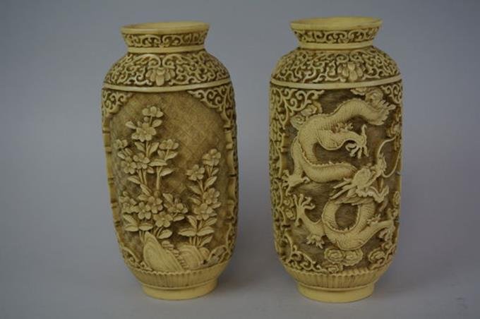 Pair of Carved Whale Bone 7-1/2" Vases One In Flower: Pair of Carved Whale Bone 7-1/2" Vases One In Flower Design One in Dragon Design Dragon Vase Has Repair on Rim